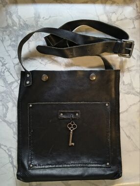 Handmade Black Leather Crossbody Bag with Vintage Key Accent